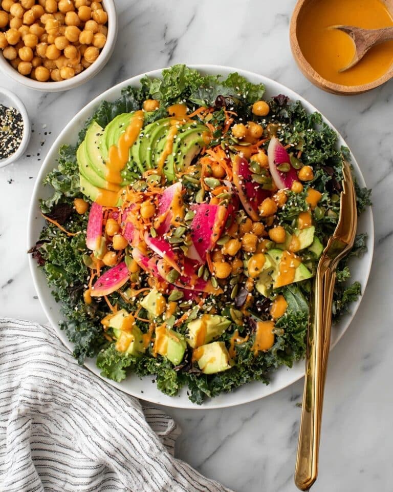 Colorful Kale Salad with Roasted Chickpeas, Avocado, and Ginger Carrot Dressing Recipe